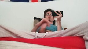 Twink masturbates and cums while watching porn