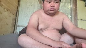 Masturbating