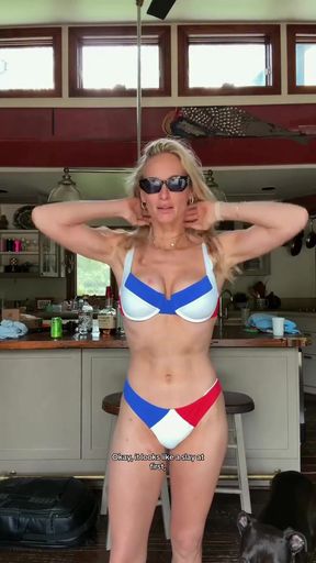 Sexy bikini babe shows off her tits