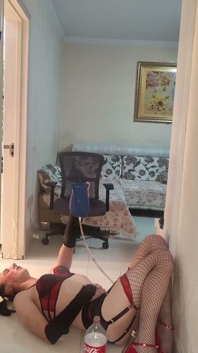 Sissy takes huge enema then bounces on dildo whilst still inflated   Clip 2