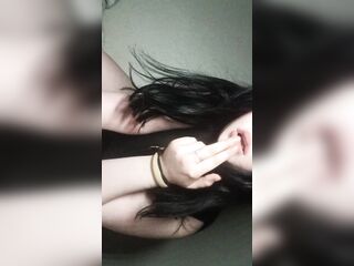 The woman show off her gorgeous body and large melons.