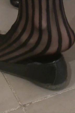 Nyllady Footplaying with a Phone Card in Patent Black Stockings