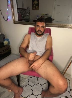 He is having fun and playing alone at home.