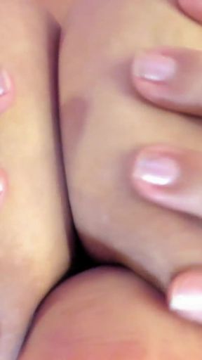 My tits are so big that my dildo disappears between them.
