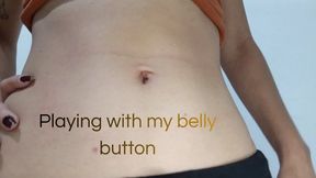 Playing with my belly button