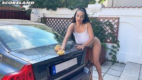 Lady with massive saggy jugs Helen Star is washing a car