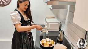 ana spears in dirndl cooking a special cake