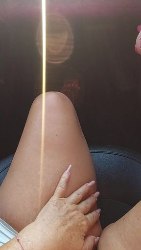 Elegant mature woman in a short skirt and high heels in a taxi in the morning   Clip 1