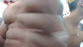 Guy Playing with a Muscular Man