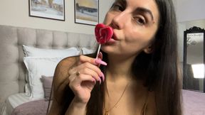 Licking a lollipop