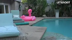 Tattooed blonde lesbians tease at the pool