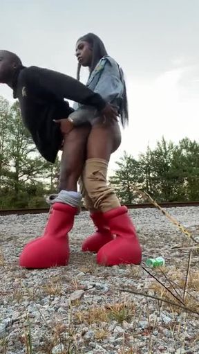 Ebony Ts rails him beside the rail lines