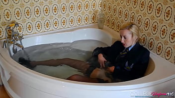 Drenched Doll Sophia Smith Keeps Her Uniform On While Taking Hot Bath!