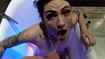 Gulping down Piss in a glowing tub