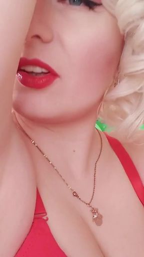 Emotional moment from &quot;Female Domination Video: Mistress in red lingerie teasing by sweaty armpits (Arya Grander)&quot;