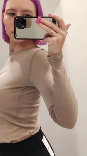 Try on haul sweaters in the fitting room. Big tits beauty pulls on clothes. View during fitting   Clip 2