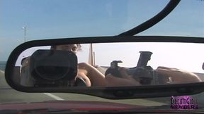 Topless in my convertible going over a bridge