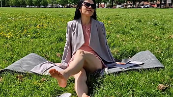 Pretty solo girl pisses in public park while showing off her fit body and naked legs