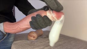 Cane Massaging the Huge Head of His Cock Until He Cums and Fills His Entire Condom!