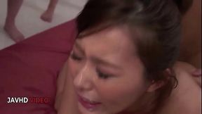 Shaved Japanese MILF drenched in intense bukkake