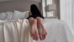 My pretty soles in this position on bed, sole scrunching and toe wiggling