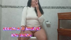 Urinating in the bathroom while smoking