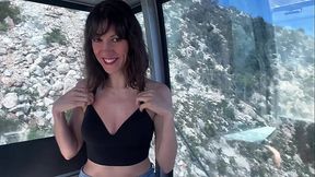 Solo girl with perfect tits and ass teases in public cable car