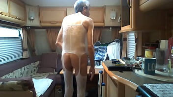 Bulgarian Bitch dressed in Womans Clothes Rides a Dildo For Several males to see him fucking himself in his Caravan with curtains open