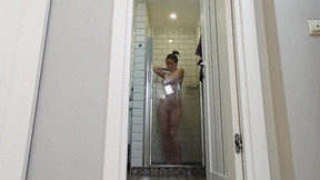 Watch my GF strip nude & get in the bathroom for a freshening shower