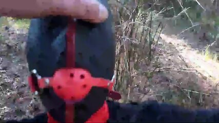 Tied to a tree on a sexy outfit, masked and outdoor deepthroat with no mercy
