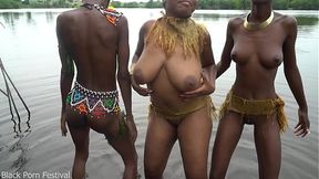 Skinny African tribe girls dance in the river forest