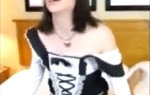 Maid in uniform knows what she is doing
