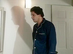 Vintage porn movie scene of a hot pair fucking