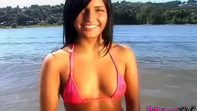 Gorgoeus petite teen teases us at the beach