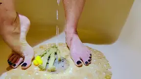 Tattooed Mature Woman Uses Feet to Play With Dildo