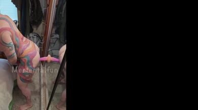 Natural redhead fit milf gets choked by suction dildo on wall