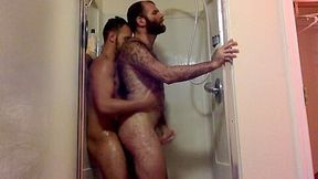 Two hairy guys fuck in the shower