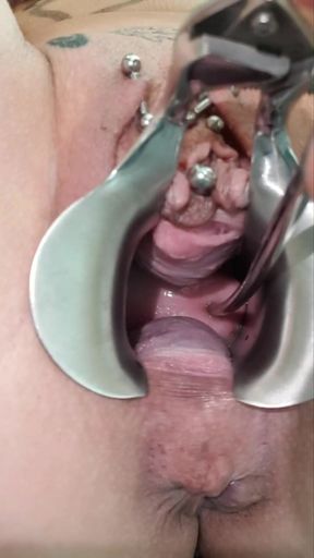 Milf Julie plays with her cervix