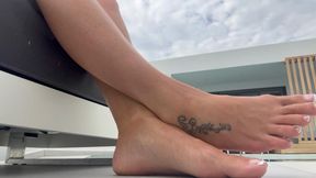 POV you're hidden under a sun lounger staring at my perfect feet