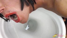 Tranny dark hair likes others pissing in her mouth