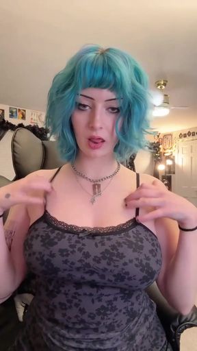 Big-titted goth babe shows off her ass and boobs