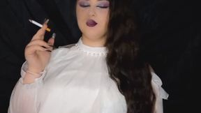 Anna smoking in latex leggings