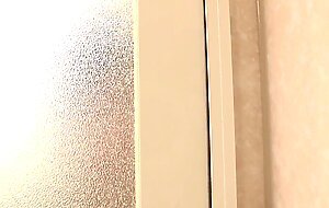 Japanese woman Yui Ayana soaps herself up and masturbates in the bathroom uncensored.