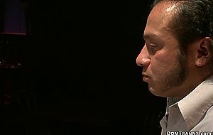 Shemale sucks cock through glory hole