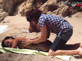 Topless Black Honey Oiled Up on the Beach... His Hands Slip Underneath Her Bikini