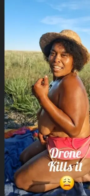 DRONE CATCHES BLACK BBW MASSAGING HER BODY IN NATURE