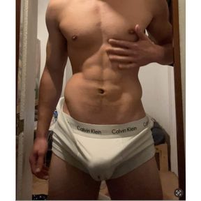 Young muscle hunk plays with himself in his tight underwear