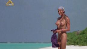 ”Pretty Bo Derek showing off her bushy twat at the beach”