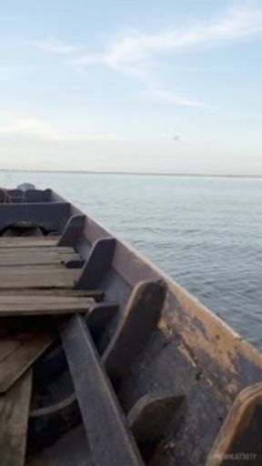 Thai girl showing her pussy and tits on a public boat.