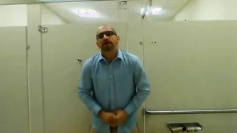 Daddy bear strokes his cock and cums in public restroom
